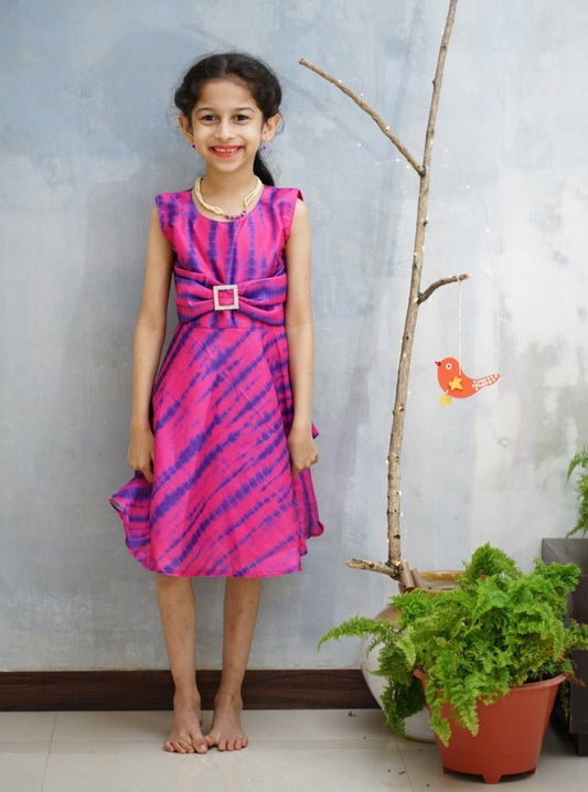 Magenta & Dark Blue Shibori Printed Tussar Silk Frock.Let your princess be as comfortable as in her casuals with carefully designed & crafted Comfort Ethnic Wear by Soyara Ethnics.Keep her fashion quotient high with timeless patterns, vibrant combinations and royal textiles.