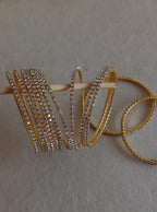Stones bangles in white stones with rainbow shine Set of 12 for girls.Adorn your princess with head to toe premium quality handcrafted accessories made from allergy free, best quality materials.
