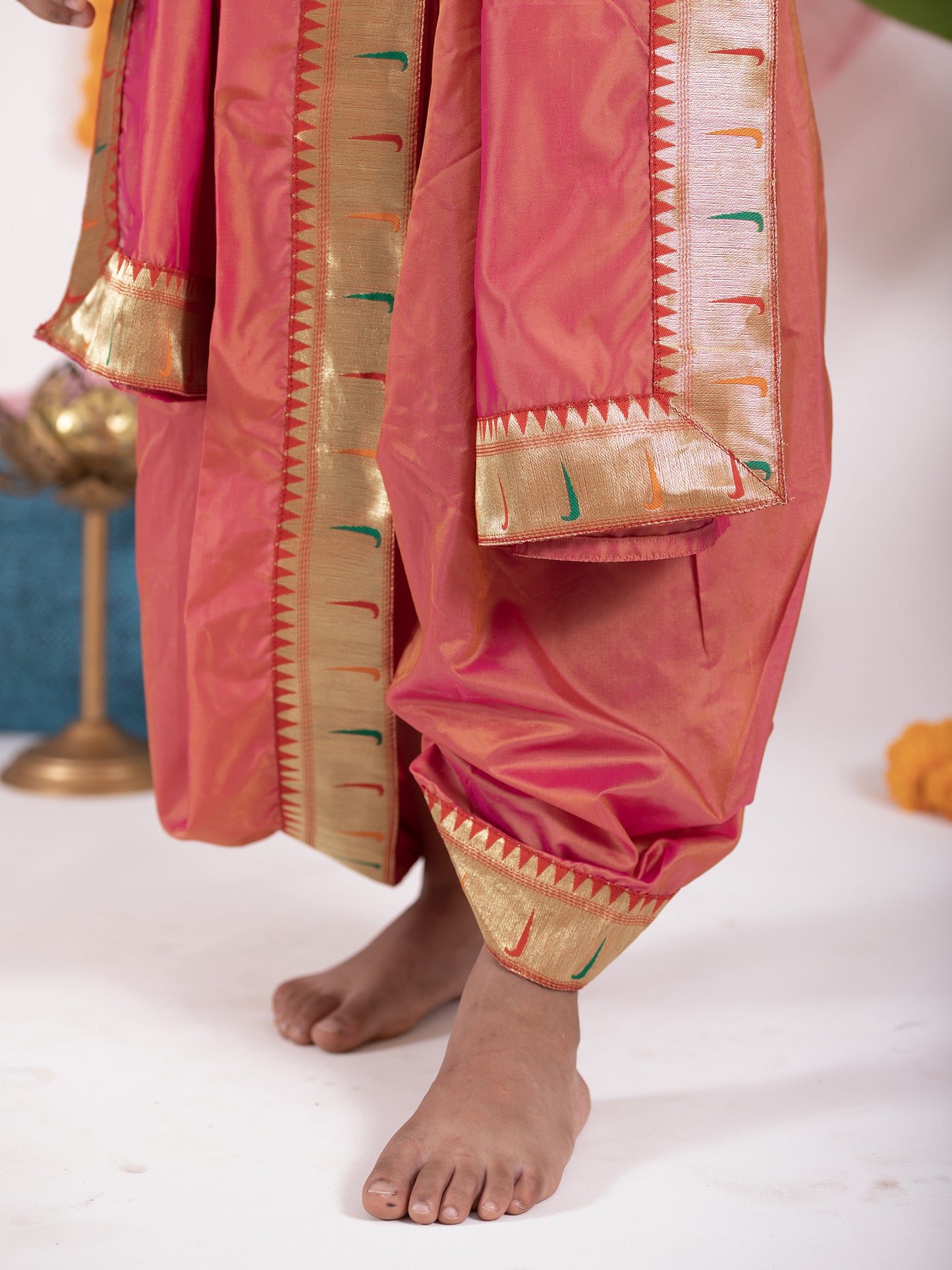 Carrot Pink Mysore Silk Dhoti/Soval/Kad & Shawl/Upran/Shela with Paithani jari Border Set for Batu.Pre-stitched sovale uparane set includes Ready to wear Sovale & Uparane/Upavastra.Can be paired with a short kurta.This Set is ideal for rituals like Matrubhojan,Muhurt during Munj/Upanayan/Vratabandha/Thread Ceremony.