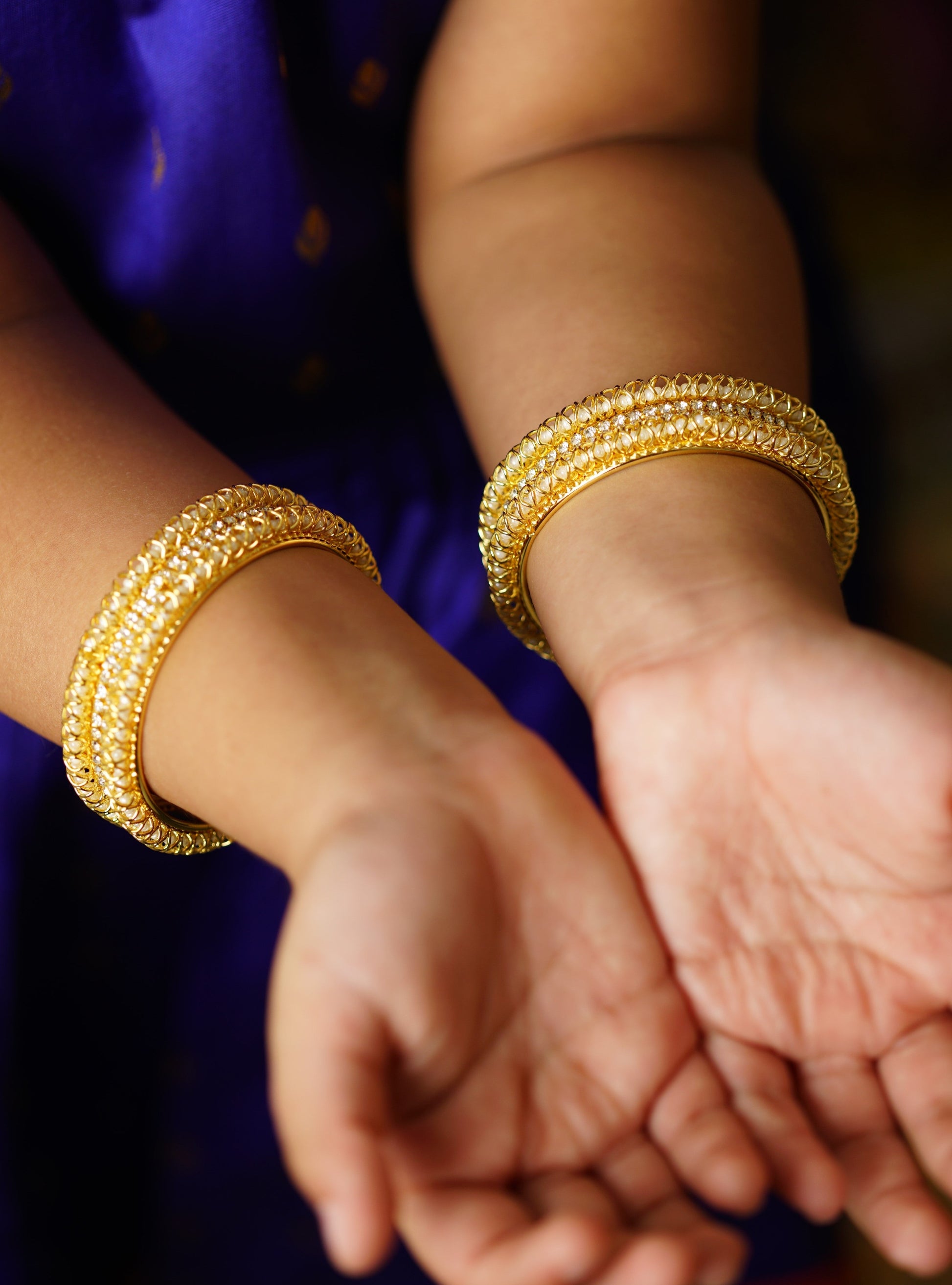 Three lined pearls and stones broad bangles Set of 2 Soyara Ethnics StudioAccessories gifts fancy traditional ethnic trendy handmade accessories handcrafted matching assorted mix n match pearl multicolour metal golden pair of bangles beaded for baby girls kids new born baby kada silver golden pearl bracelet crystal beads set of 2  