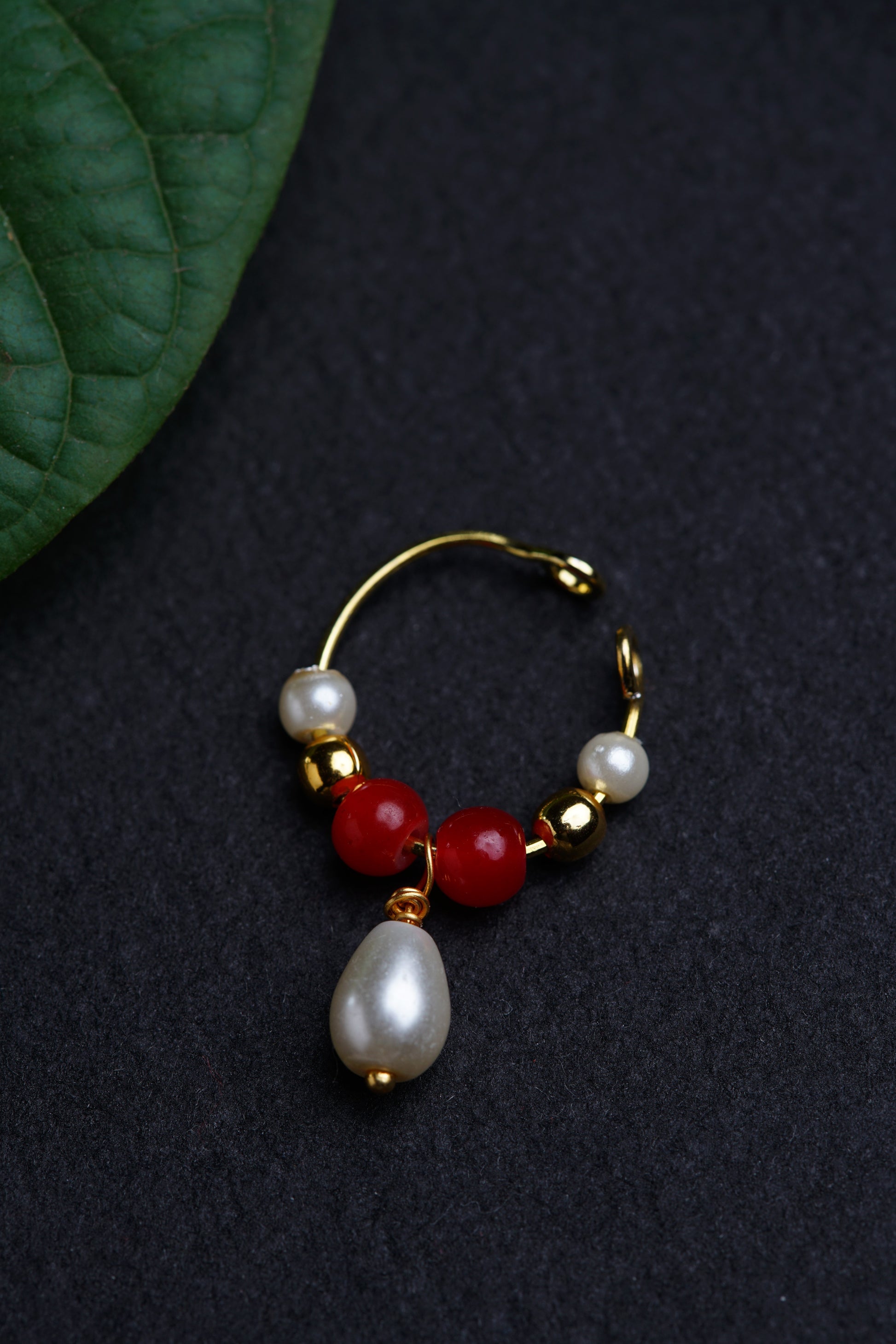 Free Size Clip on Bhikbali.You don't need piercing to wear this. Perfect Match On Traditional Outfit. Mundavalya,kanthi,bhikbali,topi,pagdi are boys accessories exclusively designed using Pearls,glass beads,jadau & gold plated findings for Batu,for Upanayan/Vratabandha/munj /thread ceremony.