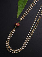 Dark Green Round Pachi bead with Pearl Triple Layer Kanthi for Batu. It is worn by Batu for Vratabandh/Munj/Upnayan/ Thread Ceremony. Mundavalya,kanthi,bhikbali,topi,pagdi are boys accessories exclusively designed using Pearls,glass beads,jadau & gold plated findings for Batu,for Upanayan/Vratabandha/munj /thread ceremony.  