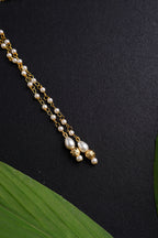 Mundavalya is a forehead ornament worn by Batu for Vratabandh/Munj/Upnayan/ Thread Ceremony.It is designed in pearls Golden Findings.Mundavalya,kanthi,bhikbali,topi,pagdi are boys accessories exclusively designed using Pearls,glass beads,jadau & gold plated findings for Batu,for Upanayan/Vratabandha/munj /thread ceremony.