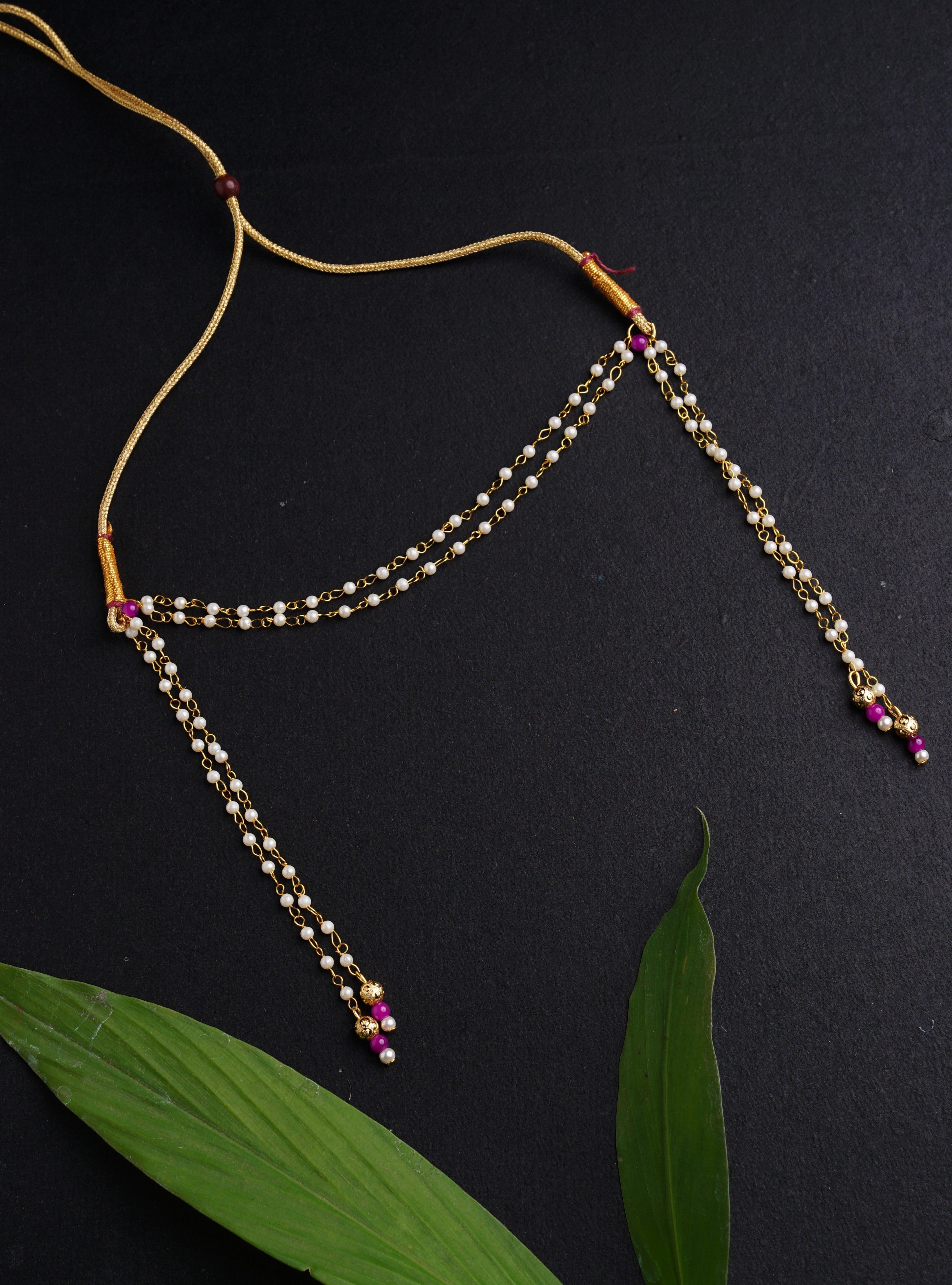 Mundavalya is a forehead ornament worn by Batu for Vratabandh/Munj/Upnayan/Thread Ceremony. Mundavalya,kanthi,bhikbali,topi,pagdi are boys accessories exclusively designed using Pearls,glass beads,jadau & gold plated findings for Batu,for Upanayan/Vratabandha/munj /thread ceremony.