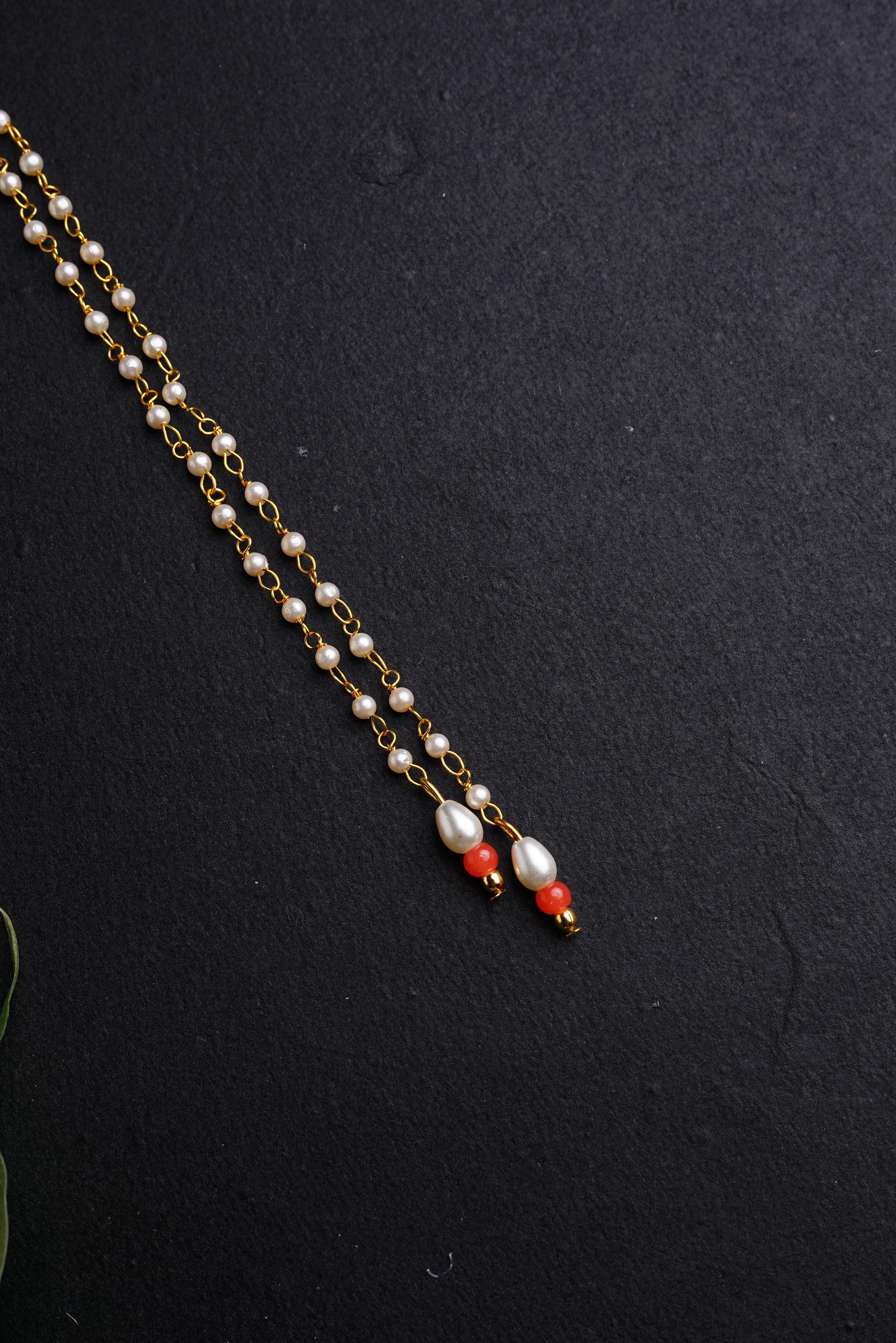 Mundavalya is a forehead ornament worn by Batu for Vratabandh/Munj/Upnayan/ Thread Ceremony. Mundavalya,kanthi,bhikbali,topi,pagdi are boys accessories exclusively designed using Pearls,glass beads,jadau & gold plated findings for Batu,for Upanayan/Vratabandha/munj /thread ceremony. 
