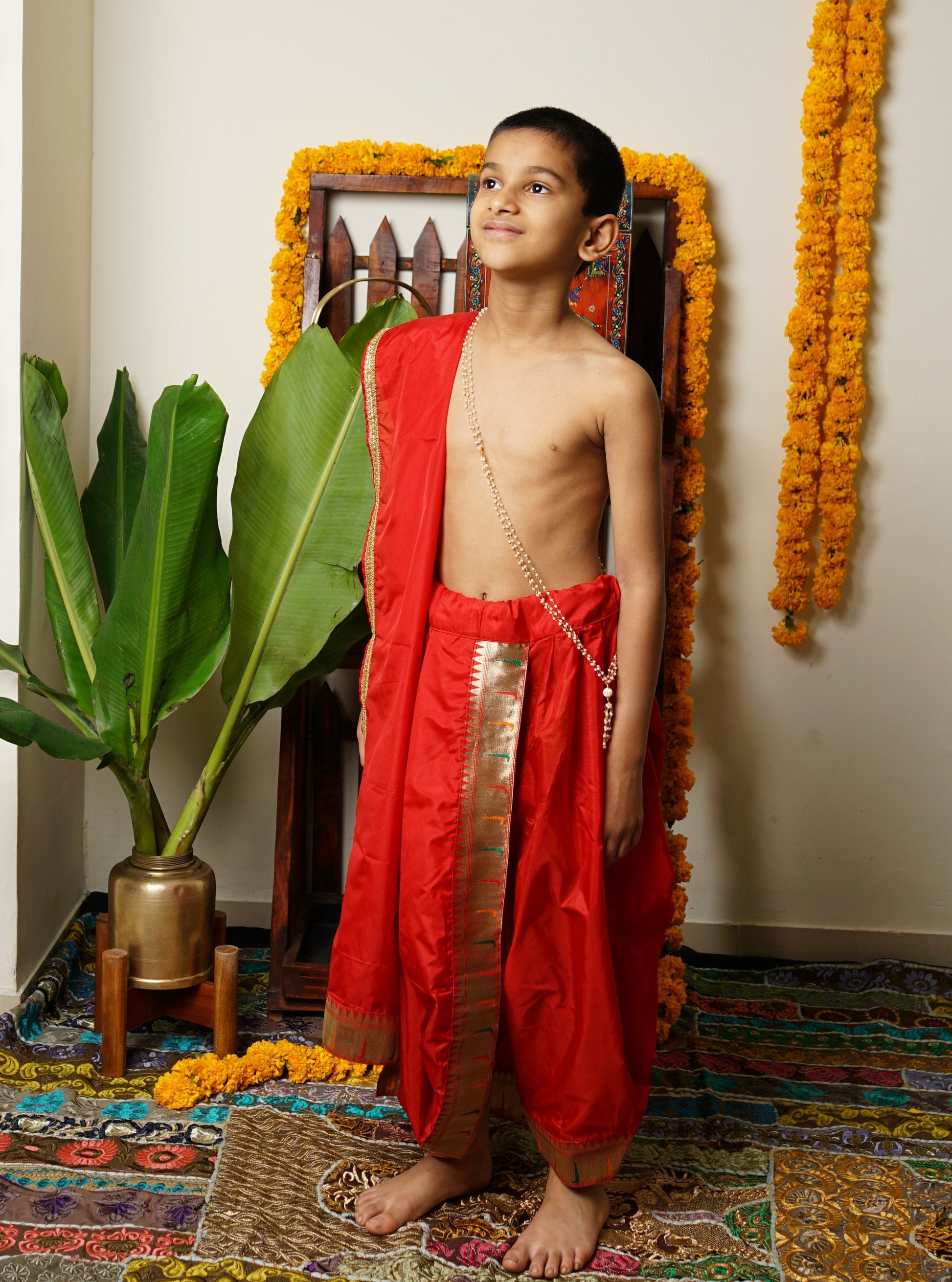 Bright red mysore silk Dhoti/Soval/Kad & Shawl/Upran/Shela with Paithani jari Border Set for Batu.Pre-stitched sovale uparane set includes Ready to wear Sovale & Uparane/Upavastra.Can be paired with a short kurta.This Set is ideal for rituals like Matrubhojan,Muhurt during Munj/Upanayan/Vratabandha/Thread Ceremony.