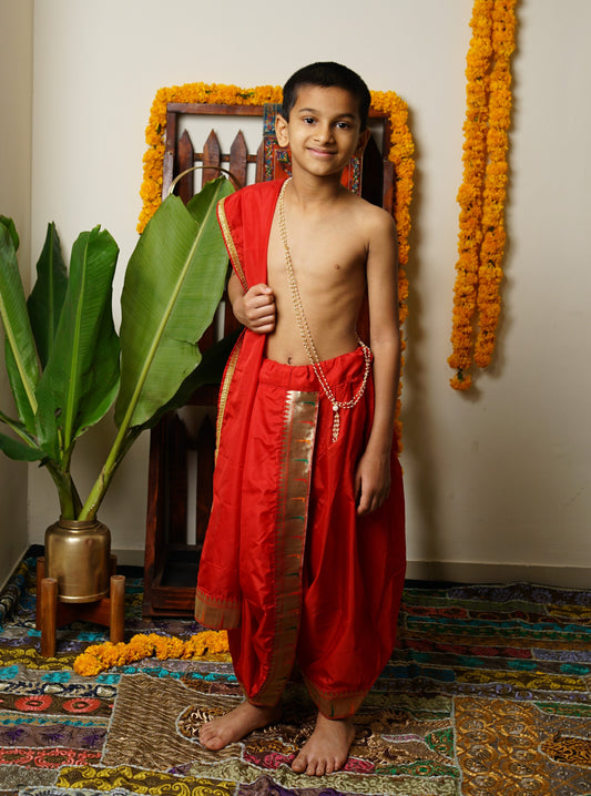 Bright red mysore silk Dhoti/Soval/Kad & Shawl/Upran/Shela with Paithani jari Border Set for Batu.Pre-stitched sovale uparane set includes Ready to wear Sovale & Uparane/Upavastra.Can be paired with a short kurta.This Set is ideal for rituals like Matrubhojan,Muhurt during Munj/Upanayan/Vratabandha/Thread Ceremony.