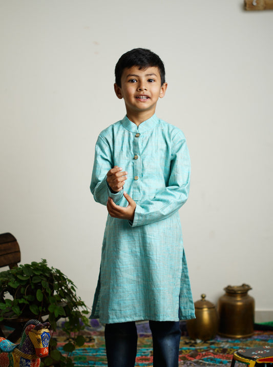 Sky Blue Khadi silk stand collar long kurta with wooden buttons.Kurtas with collar or Angrakha pattern teamed with salwar are the best choice for any festive occasion for boys.They are Trendy, Easy to wear and comfortable to carry.