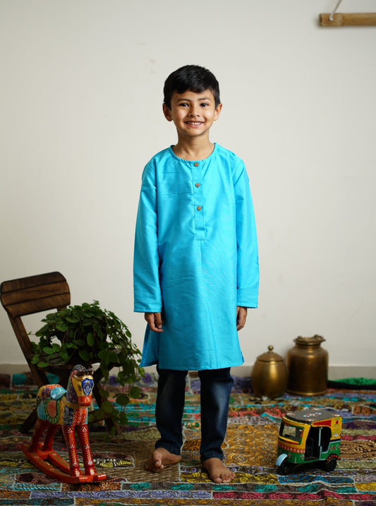 Sky Blue cotton silk Round neck long kurta with wooden buttons.Kurtas with collar or Angrakha pattern teamed with salwar are the best choice for any festive occasion for boys.They are Trendy, Easy to wear and comfortable to carry.