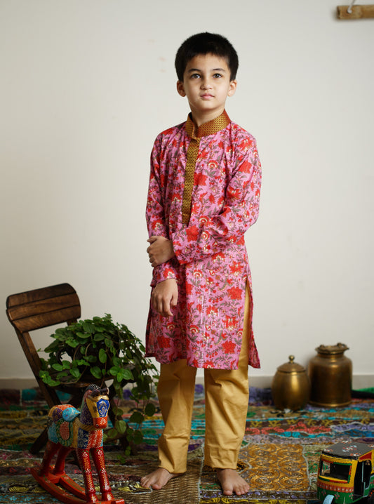 Lilac colored Sanganeri Cotton block printed Stand Collar Kurta with silver jari weaved lines.Kurtas with collar or Angrakha pattern teamed with salwar are the best choice for any festive occasion for boys.They are Trendy, Easy to wear and comfortable to carry.