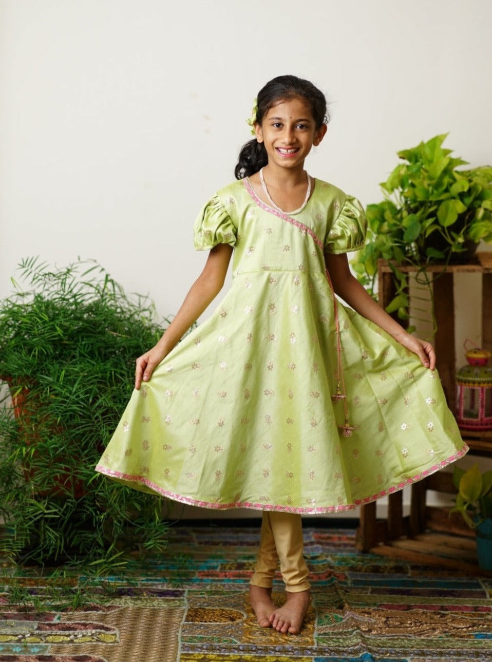 Lime green taffeta silk kurti.Let your princess be as comfortable as in her casuals with carefully designed & crafted Comfort Ethnic Wear by Soyara Ethnics.Keep her fashion quotient high with timeless patterns, vibrant combinations and royal textiles.