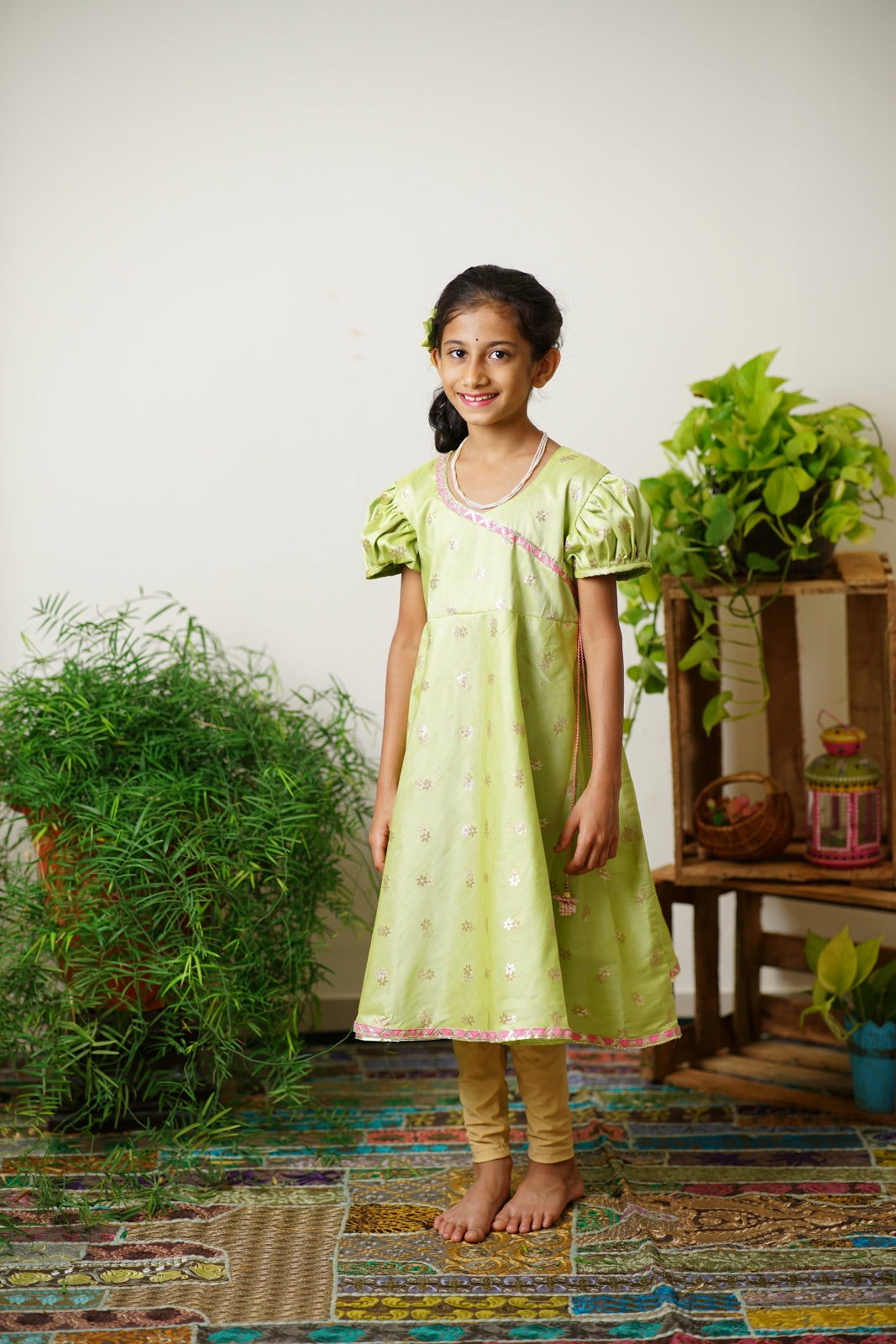 Lime green taffeta silk kurti.Let your princess be as comfortable as in her casuals with carefully designed & crafted Comfort Ethnic Wear by Soyara Ethnics.Keep her fashion quotient high with timeless patterns, vibrant combinations and royal textiles.