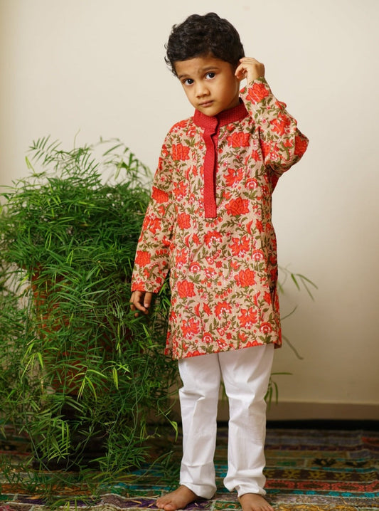 Sanganeri Cotton block printed Stand Collar Kurta with silver jari weaved lines.Kurtas with collar or Angrakha pattern teamed with salwar are the best choice for any festive occasion for boys.They are Trendy, Easy to wear and comfortable to carry.