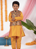 Mango coloured taffeta kurta and salwar set with digital printed silk jacket.Kurtas with collar or Angrakha pattern teamed with salwar are the best choice for any festive occasion for boys. They are Trendy, Easy to wear and comfortable to carry.