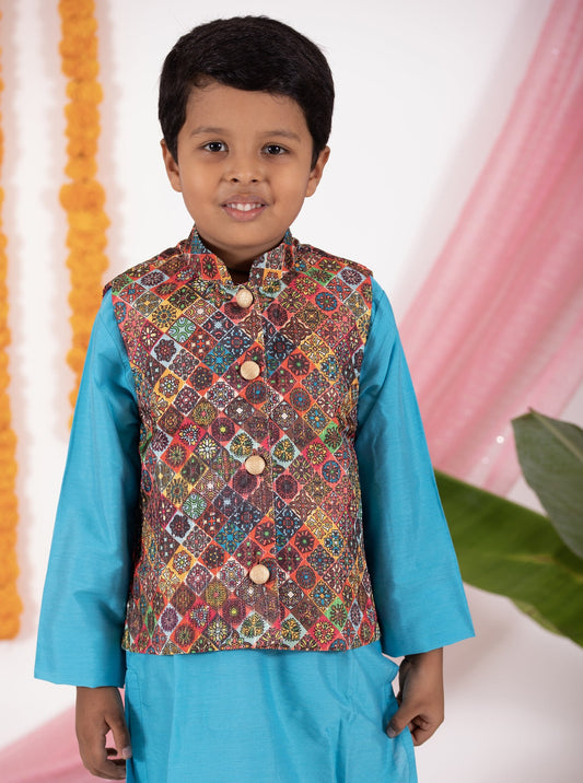 Digital printed tussar silk jacket with all over sequins.Cotton lining from inside avoid sweating but give warmth.Statement embellished buttons add royal charm to these jackets. Team these with any plain colored kurta or satin shirt for best festive look! 